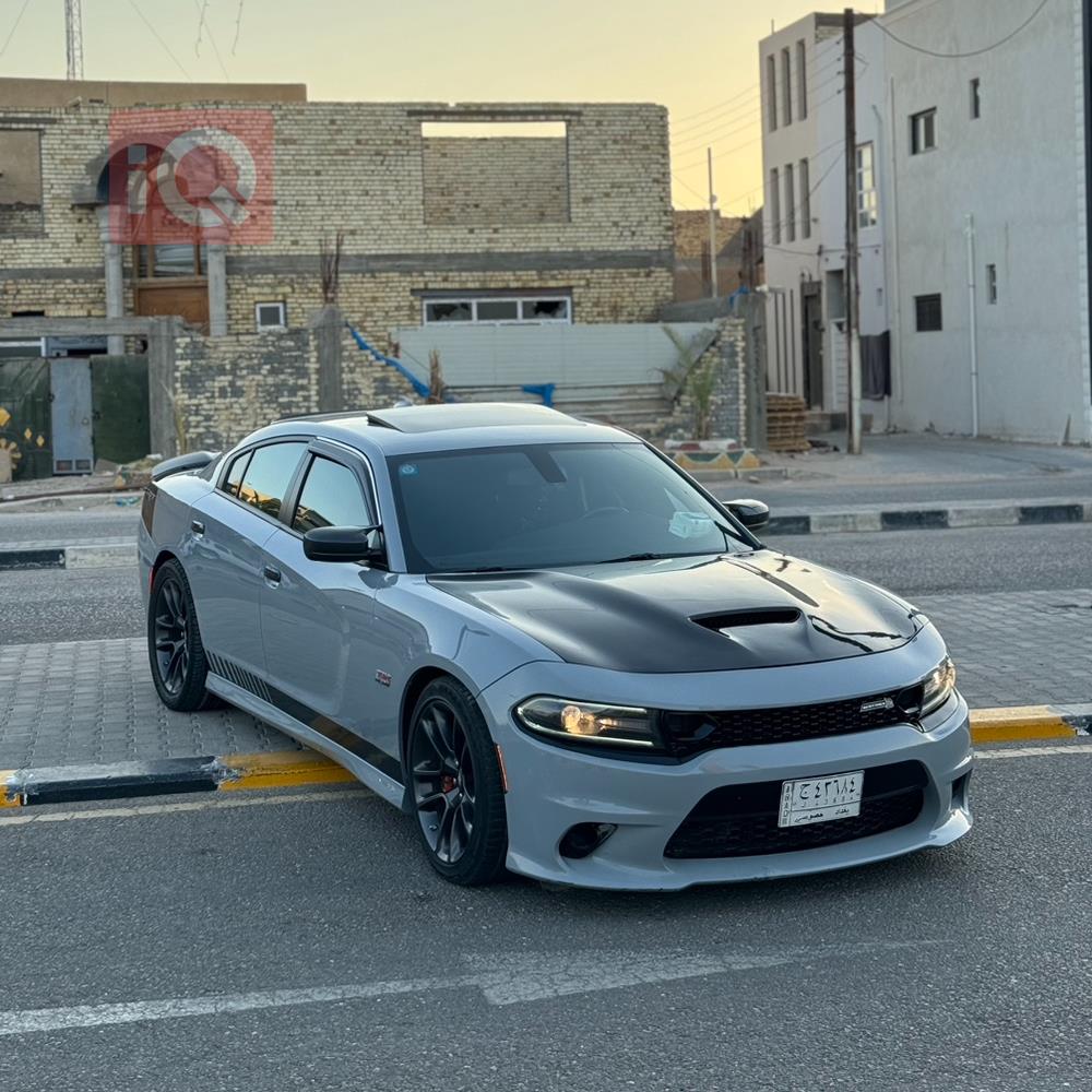 دۆج چارجەر